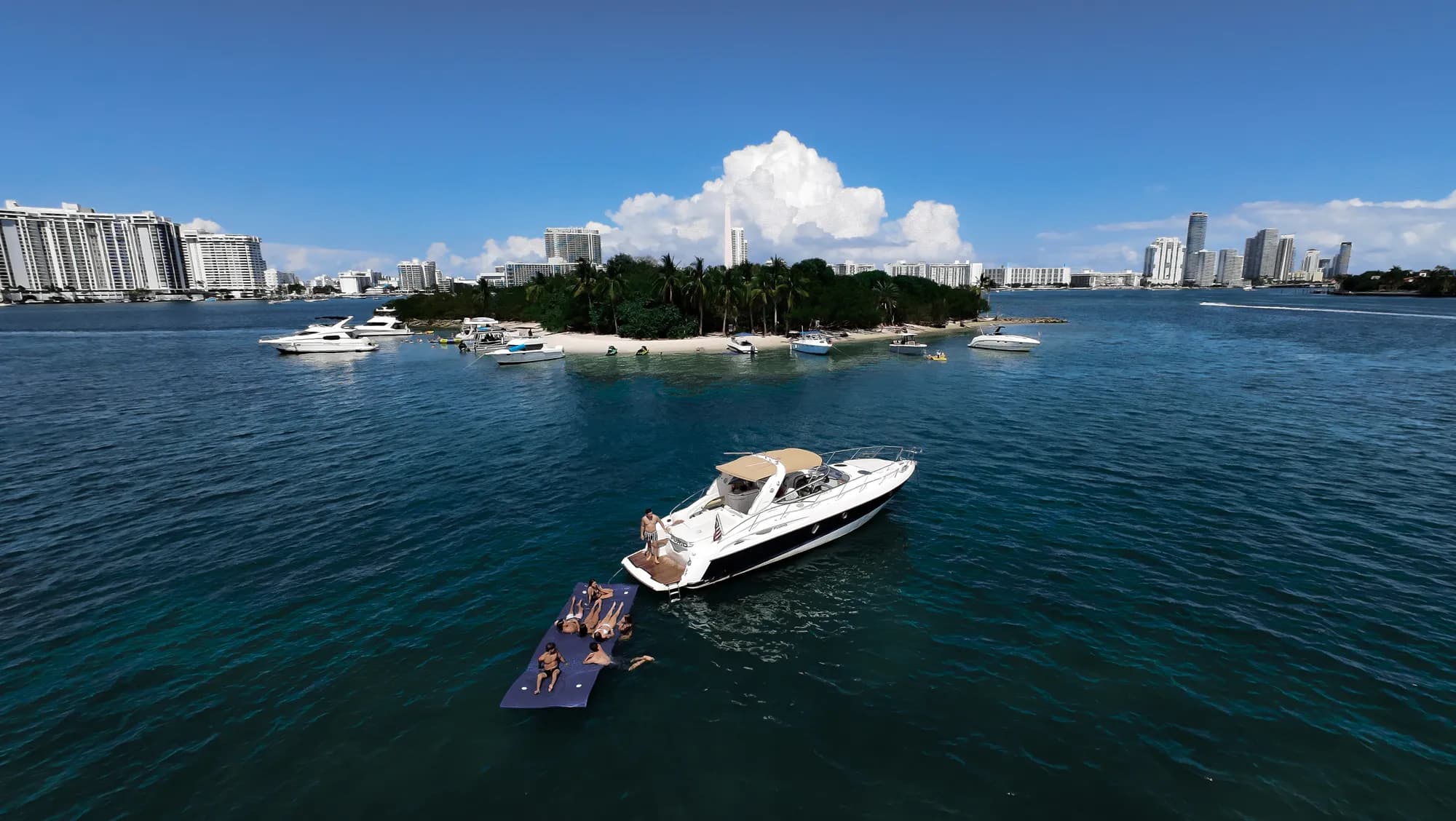 Aerial — the Cranchi 45 with guests off a Miami island