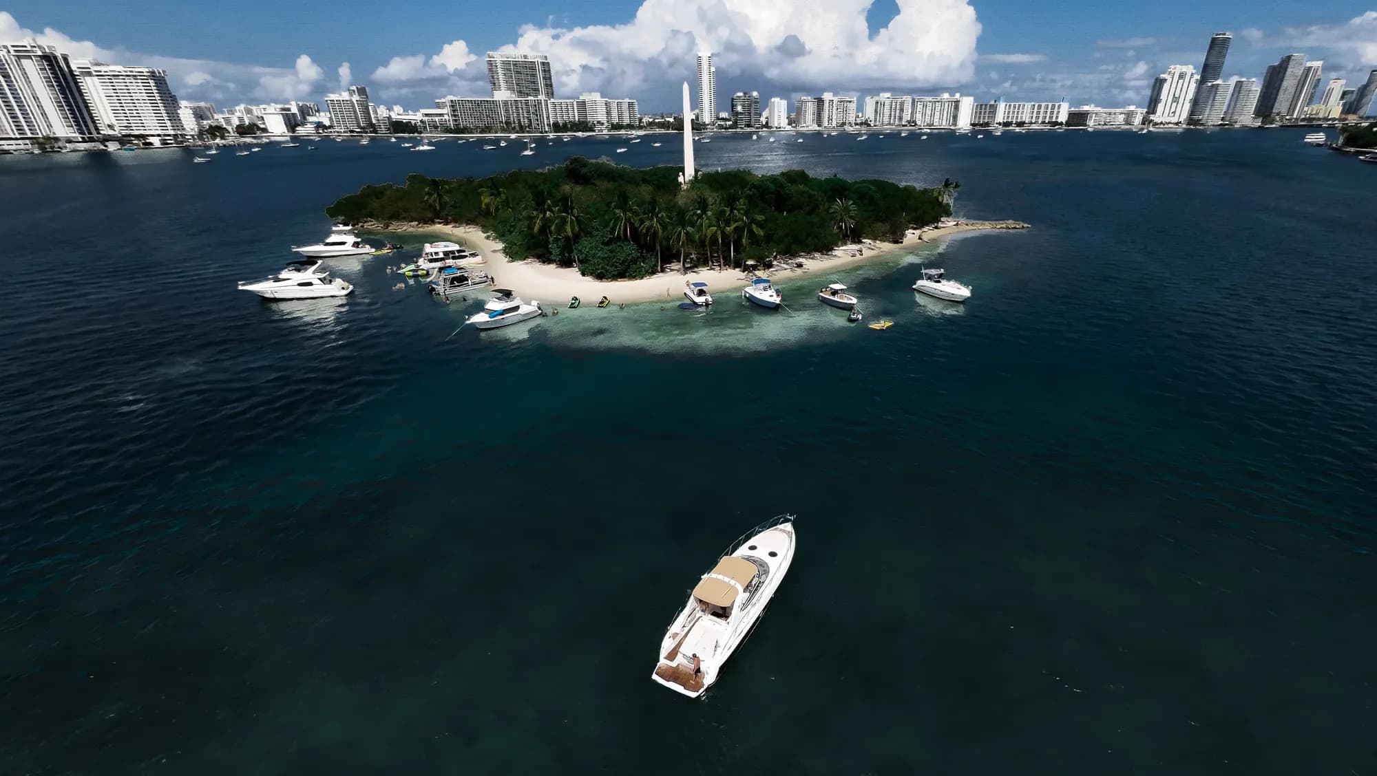 Aerial — a Miami island and the skyline from above