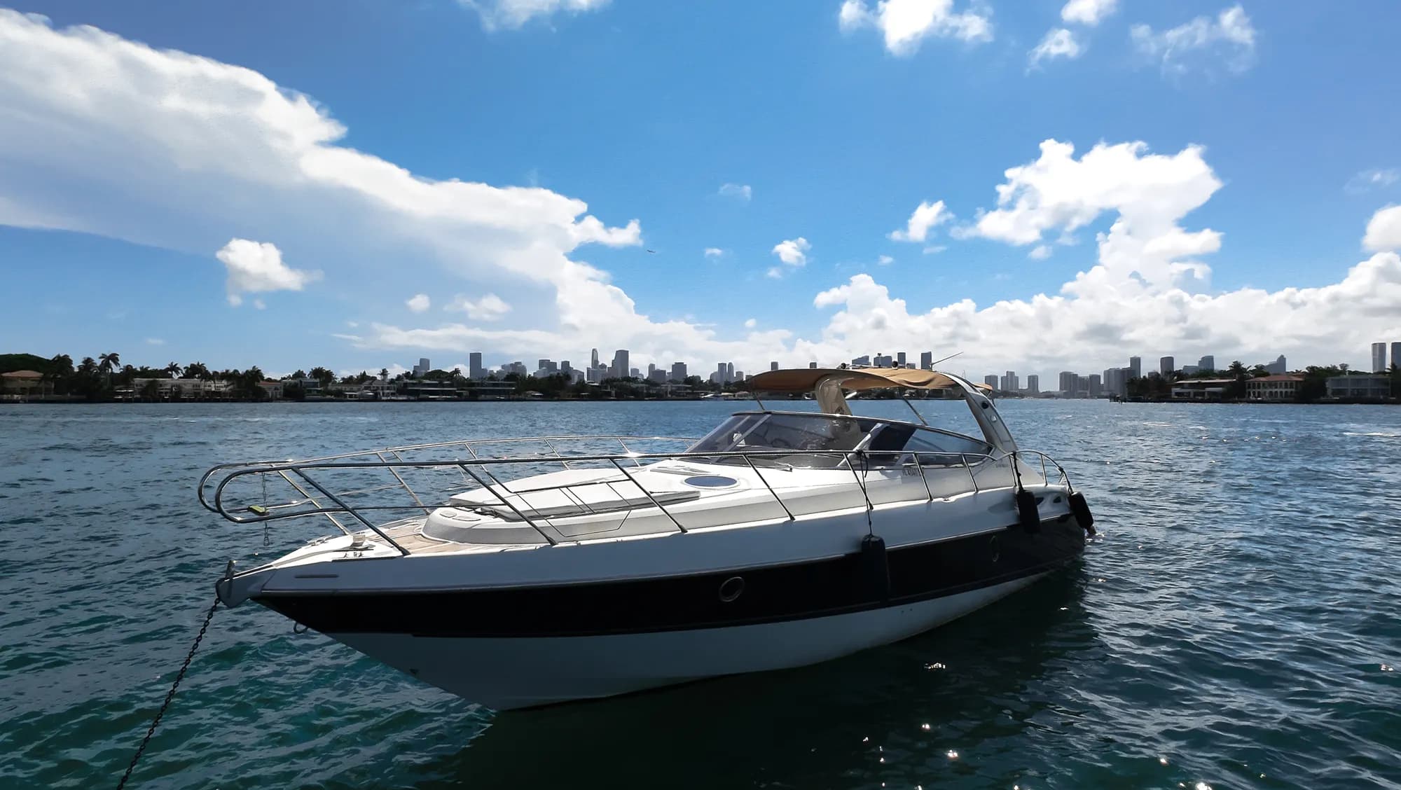 The Cranchi 45 — side profile with the Miami skyline