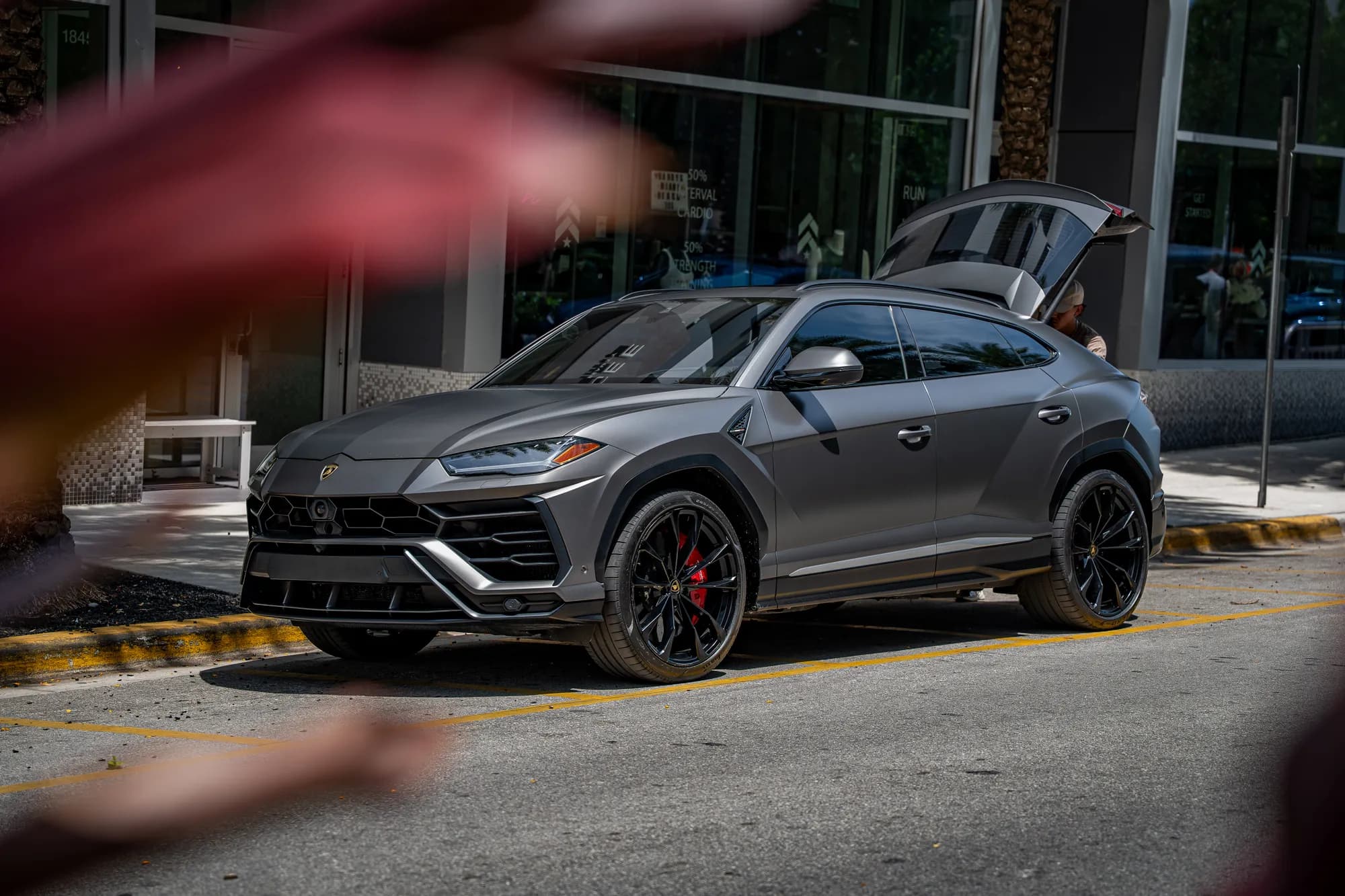 Lamborghini Urus — front three-quarter on a Miami street