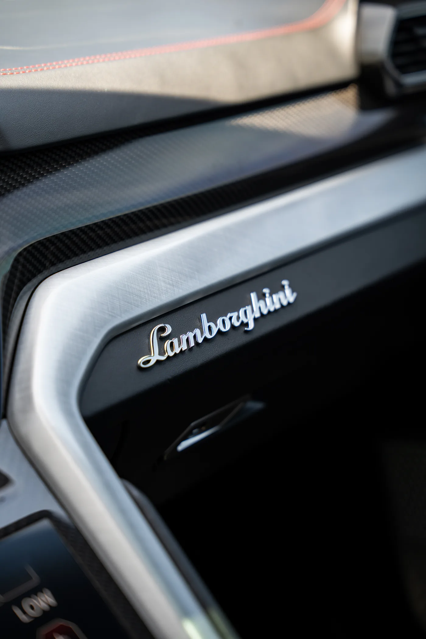 Lamborghini Urus — Lamborghini script on the carbon trim
