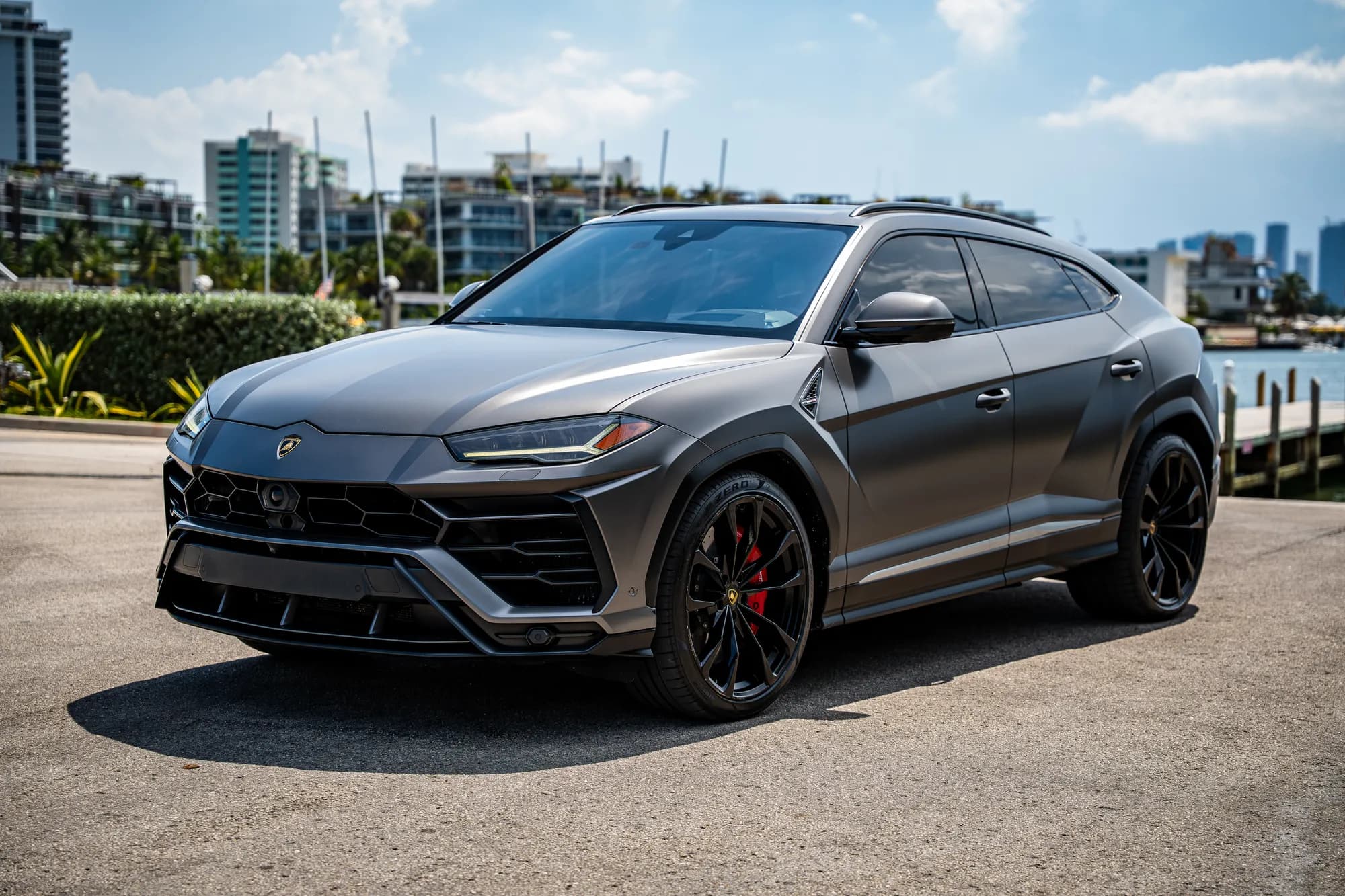 Lamborghini Urus — front three-quarter on the Miami waterfront