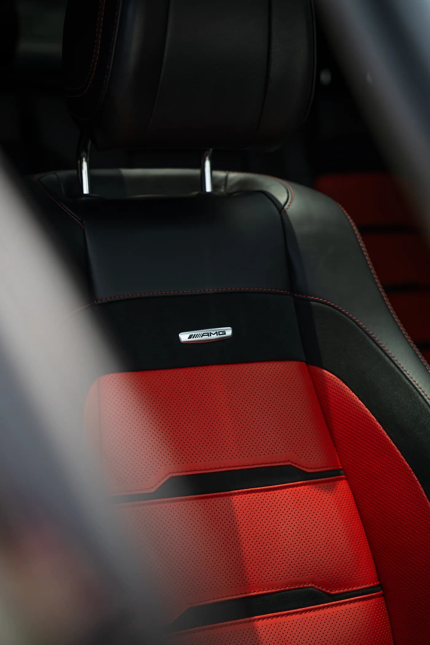 Mercedes-AMG — red leather seat with AMG embossing