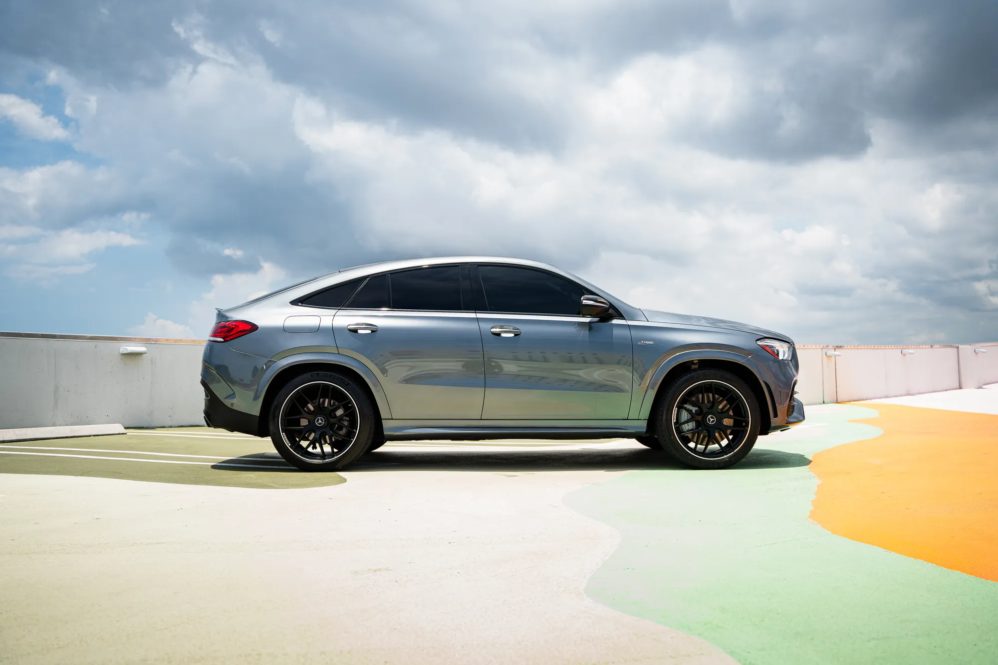 Mercedes-AMG GLE 53 Coupe — side profile on a rooftop