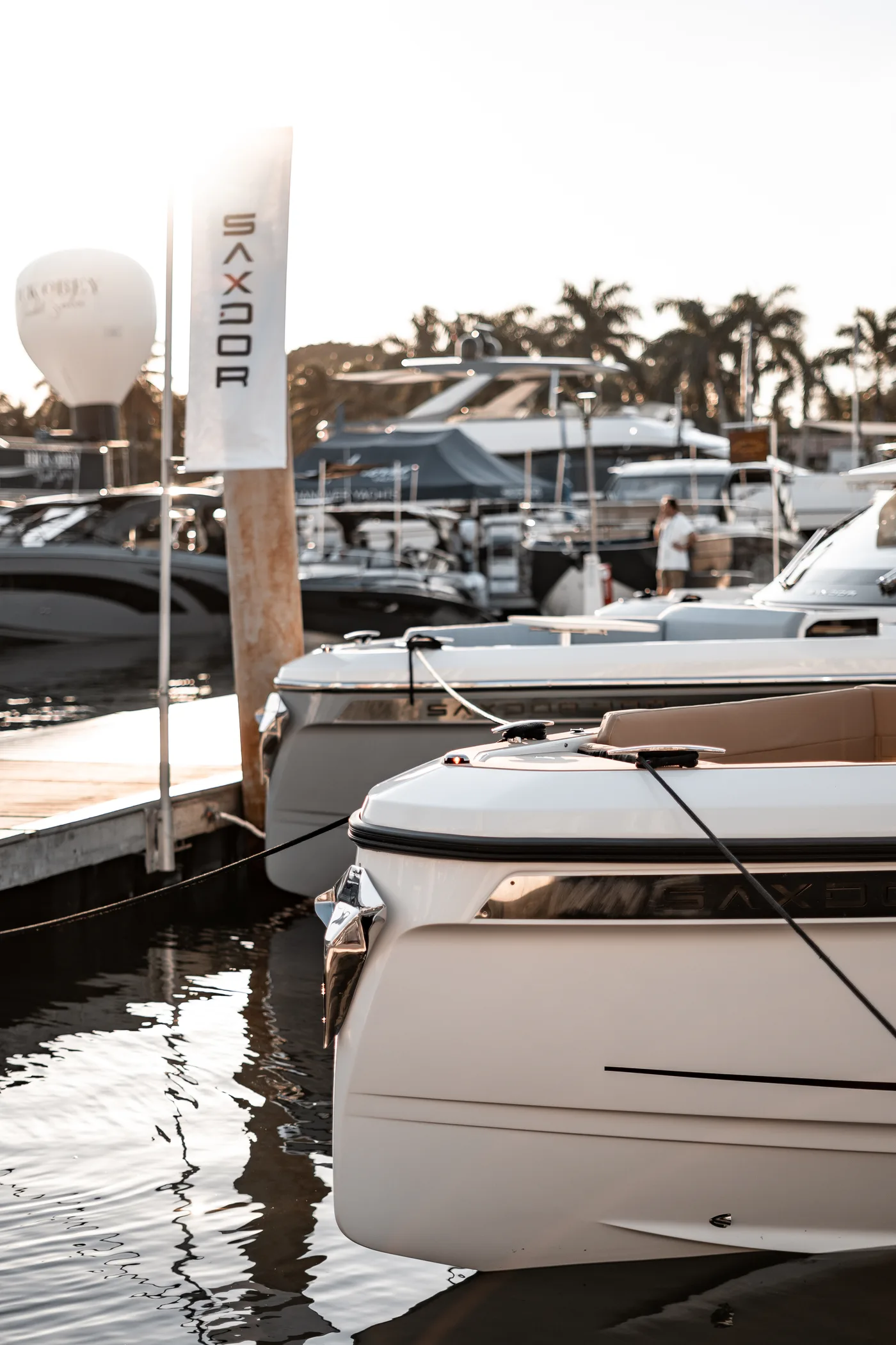 The marina row at the show with an Exodus flag