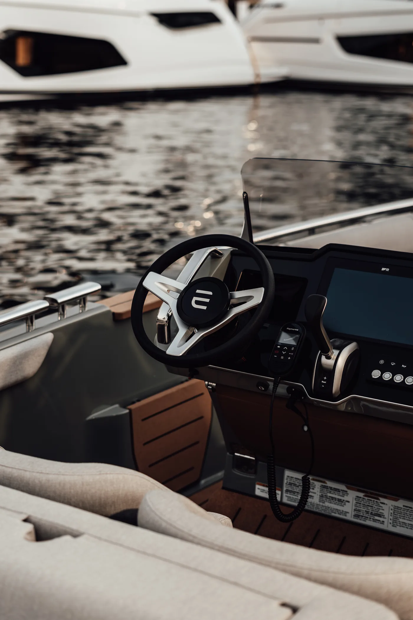 A helm wheel and cognac-leather cockpit