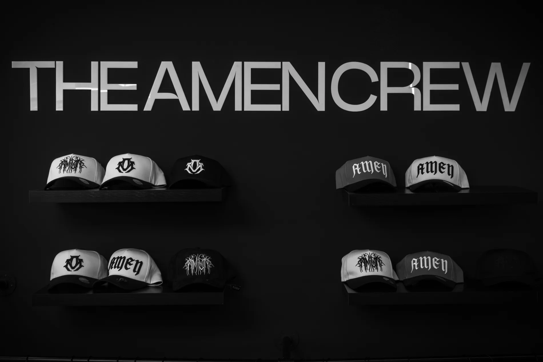 The Amen Crew cap display