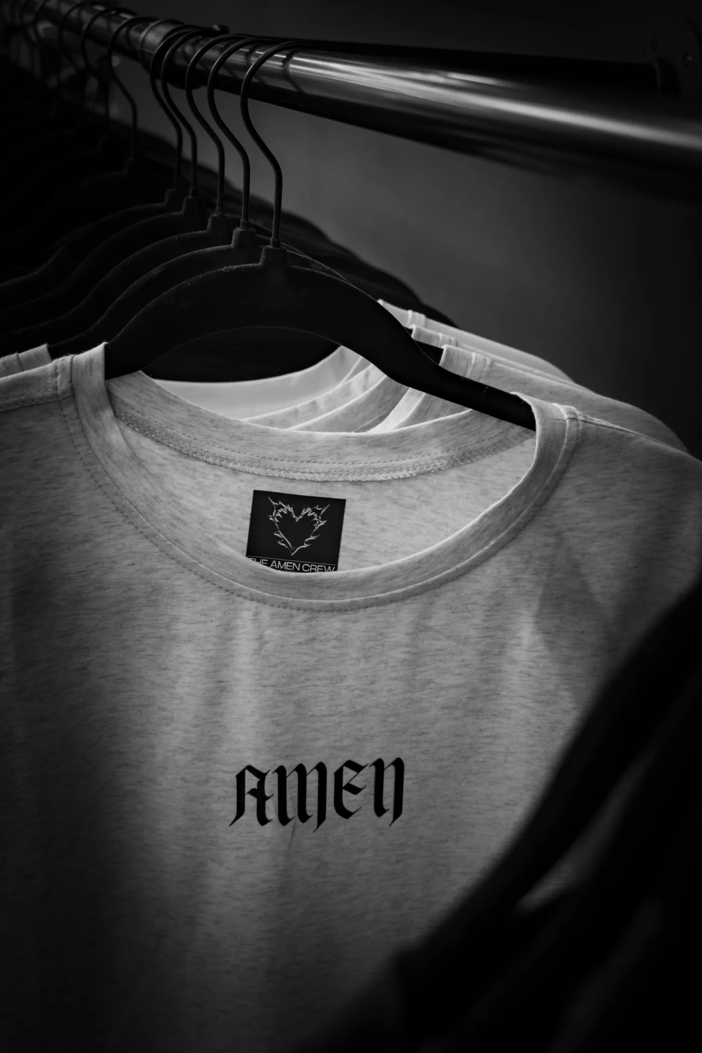 An Amen tee on the rail