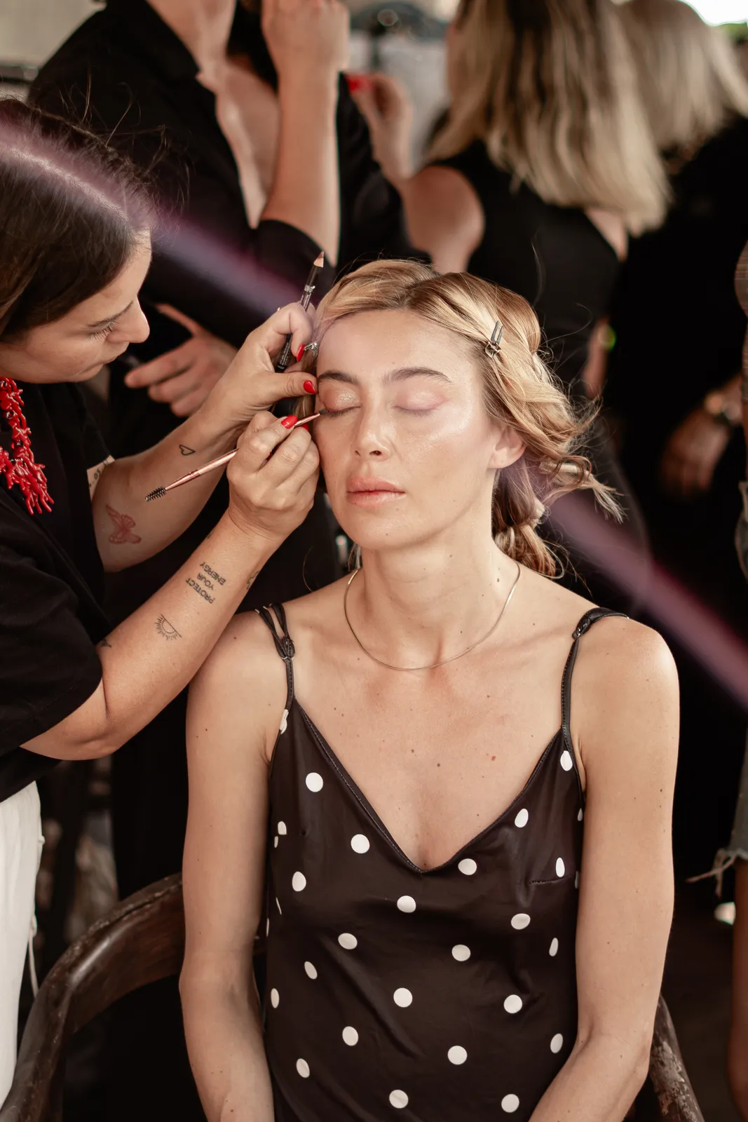 Eye makeup applied before a model's walk