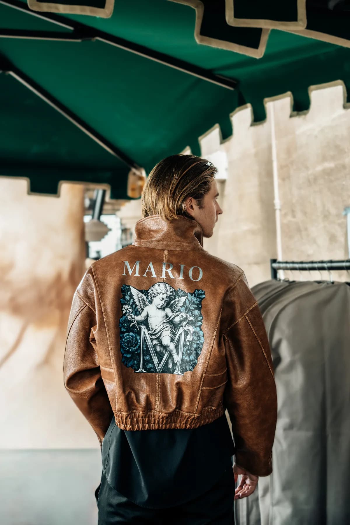 The back of the designer MARIO leather jacket backstage