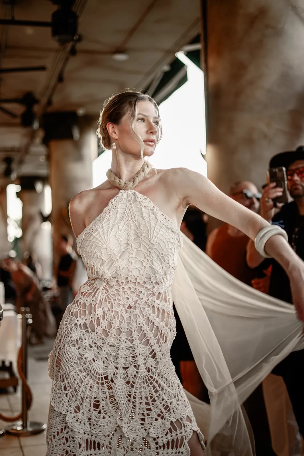 A crochet look in motion on the runway