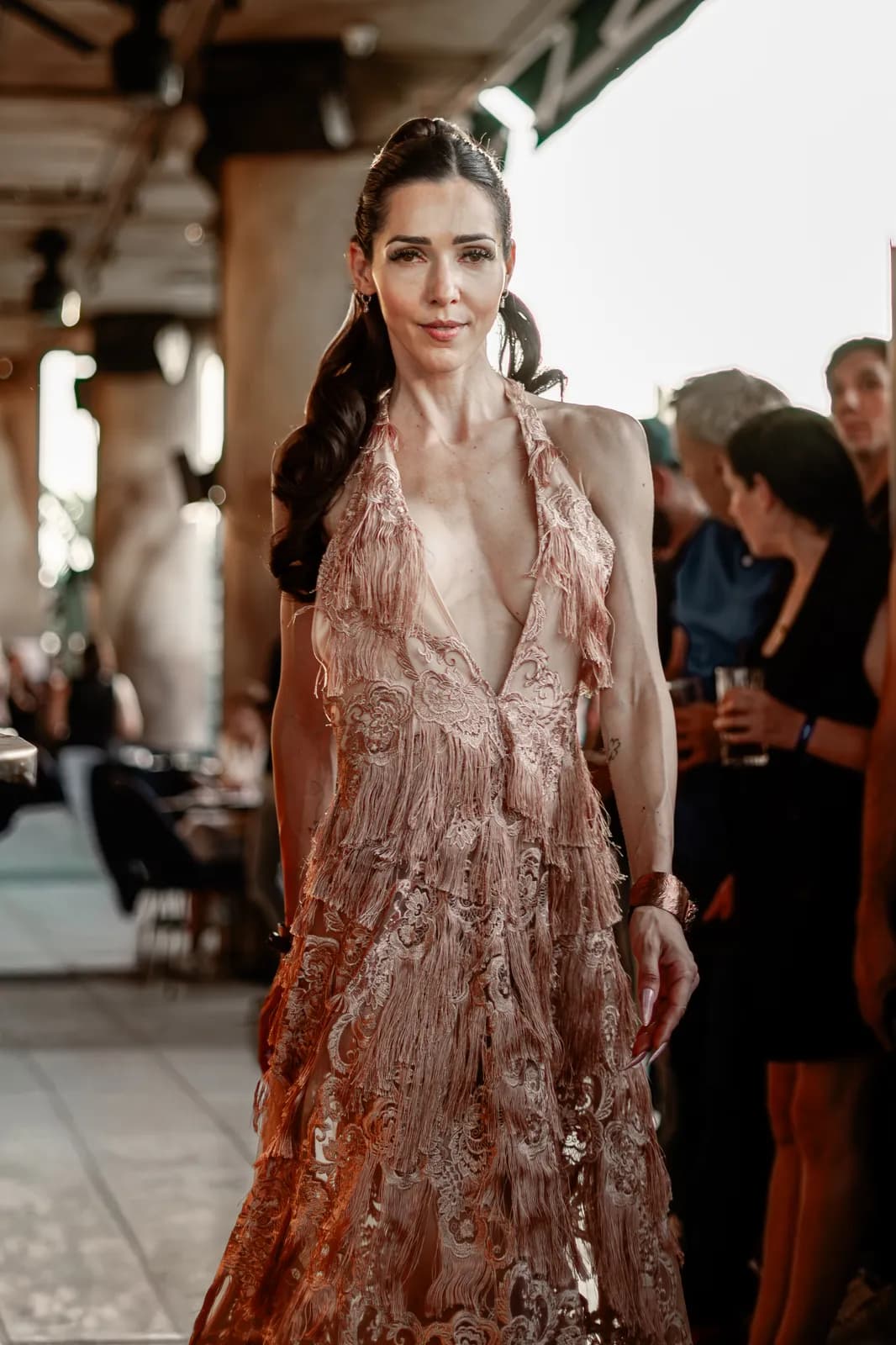 A rose-lace gown on the runway
