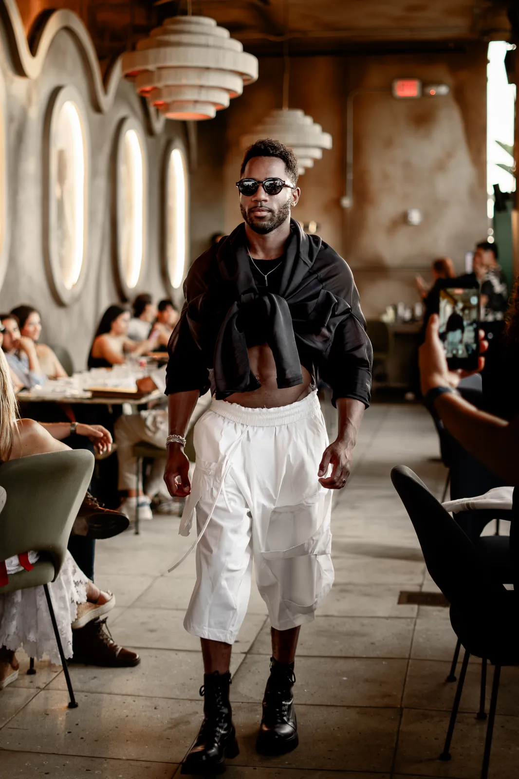 A male look in white on the runway