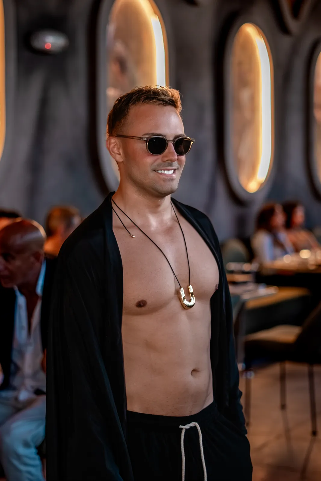 A male model walking the runway