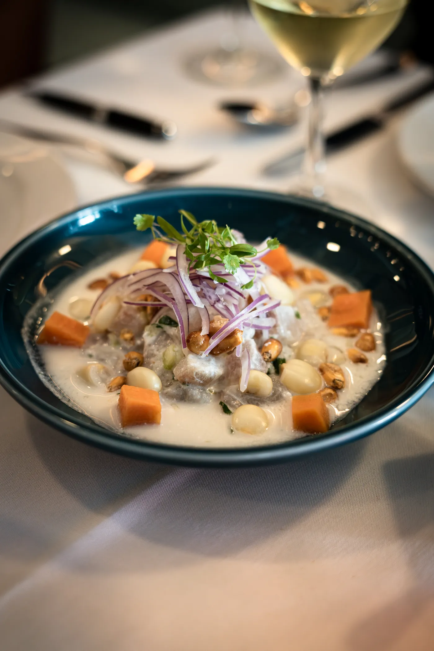 Peruvian ceviche in a blue bowl