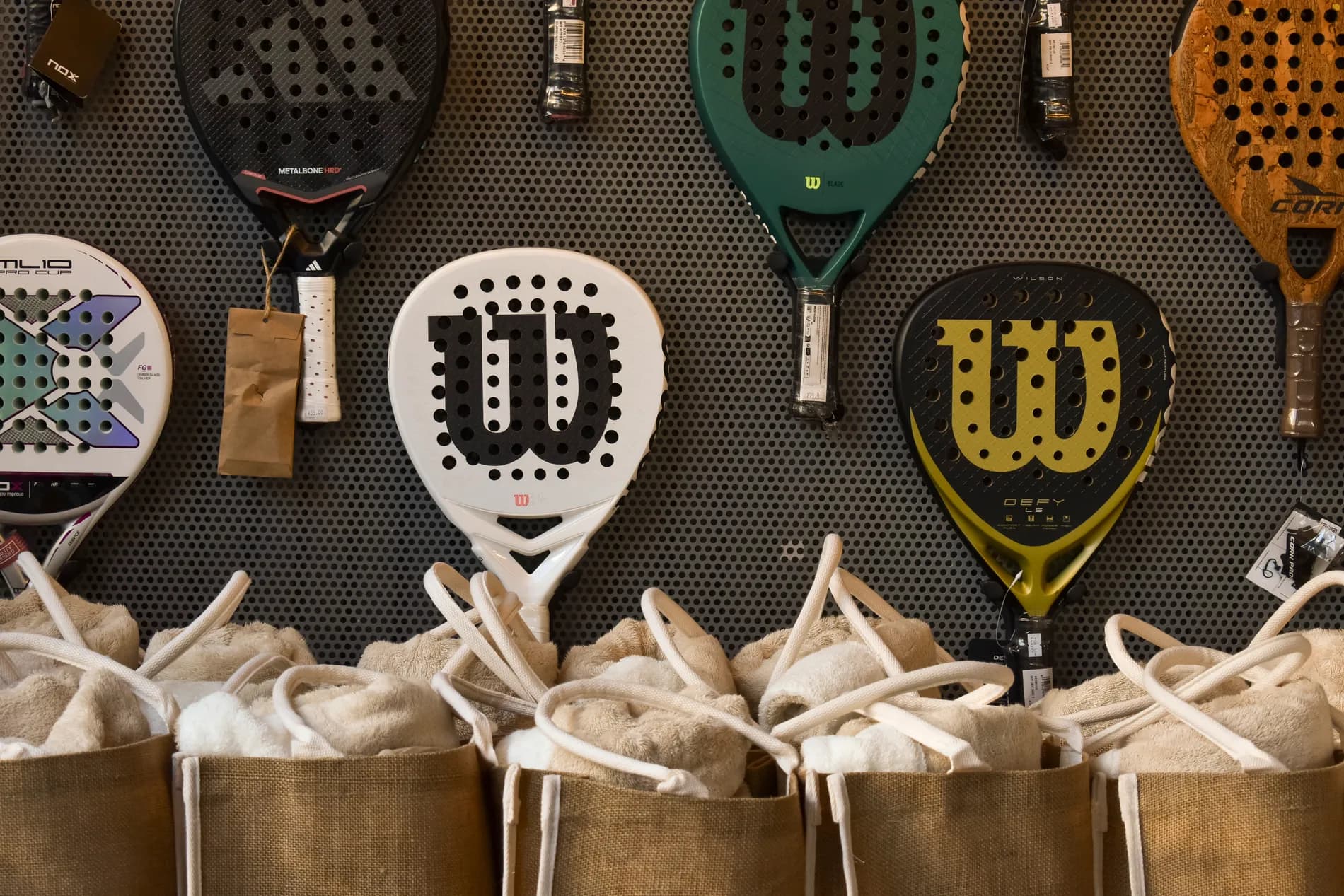 Rackets and welcome gifts laid out for players