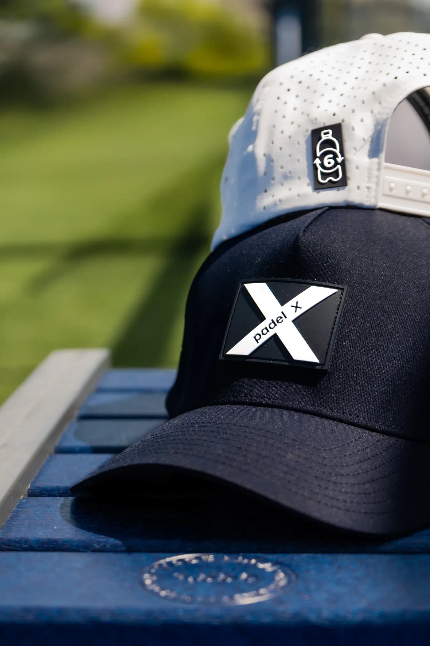 Two colourways of the Padel X cap