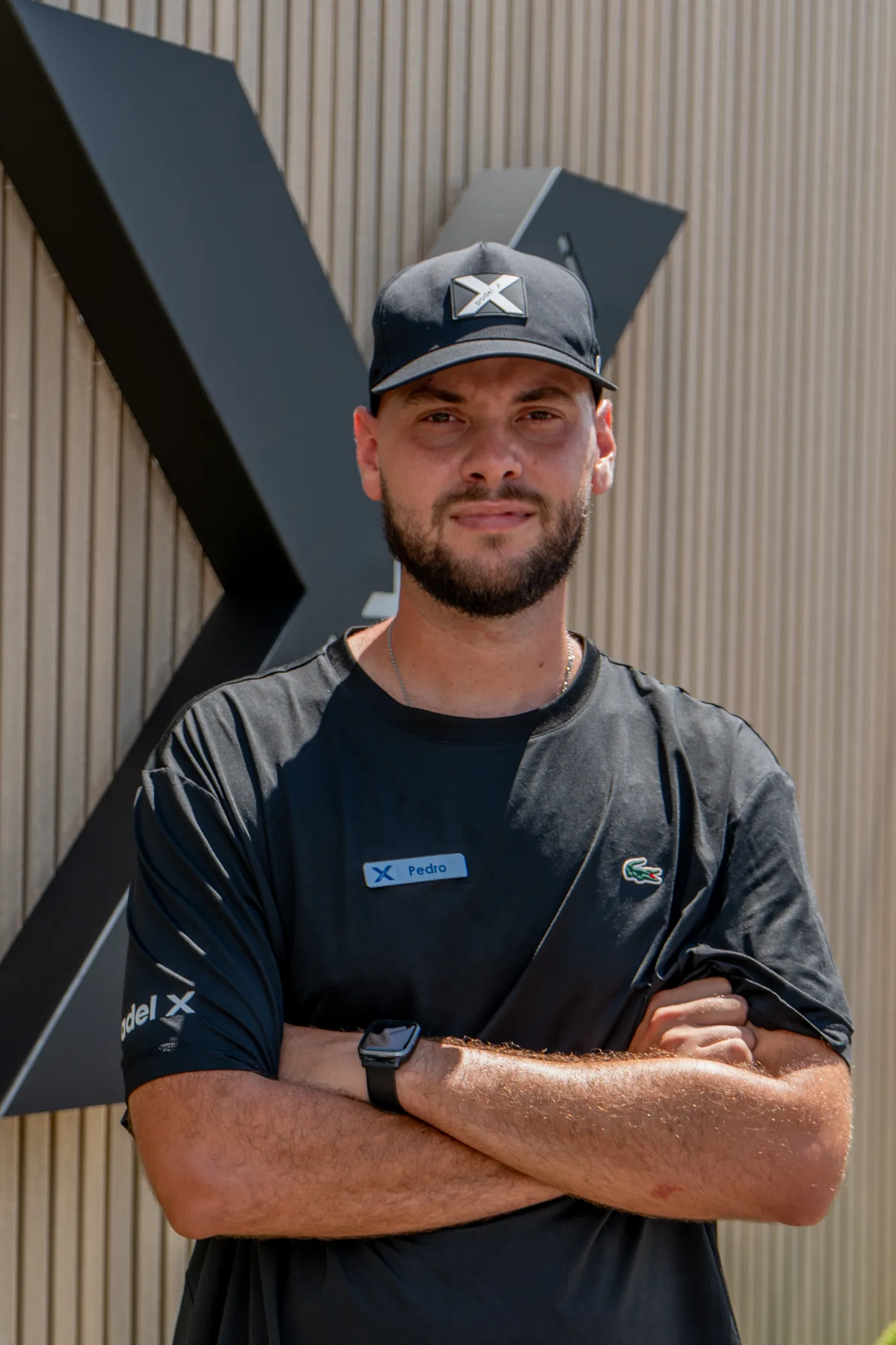 Team portrait in a Padel X cap