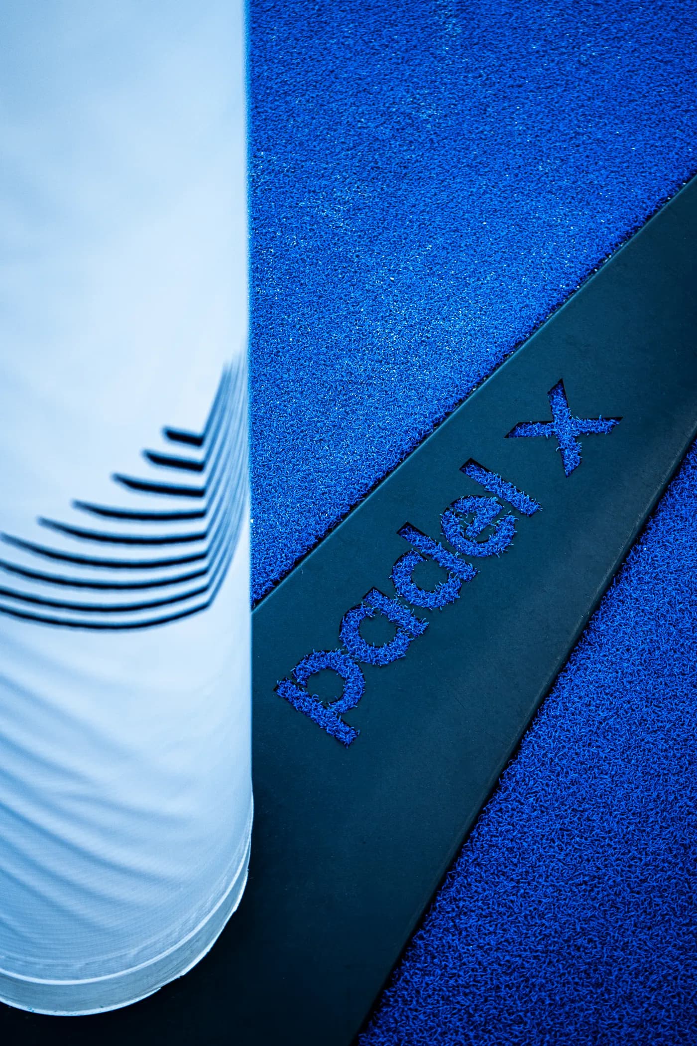 The Padel X mark on the court surface