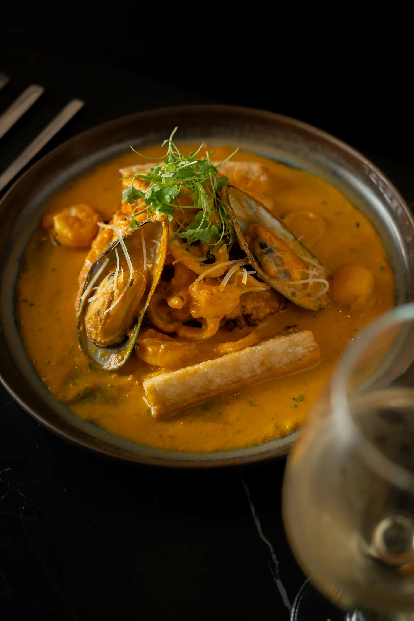 Seafood in a creamy ají sauce with mussels